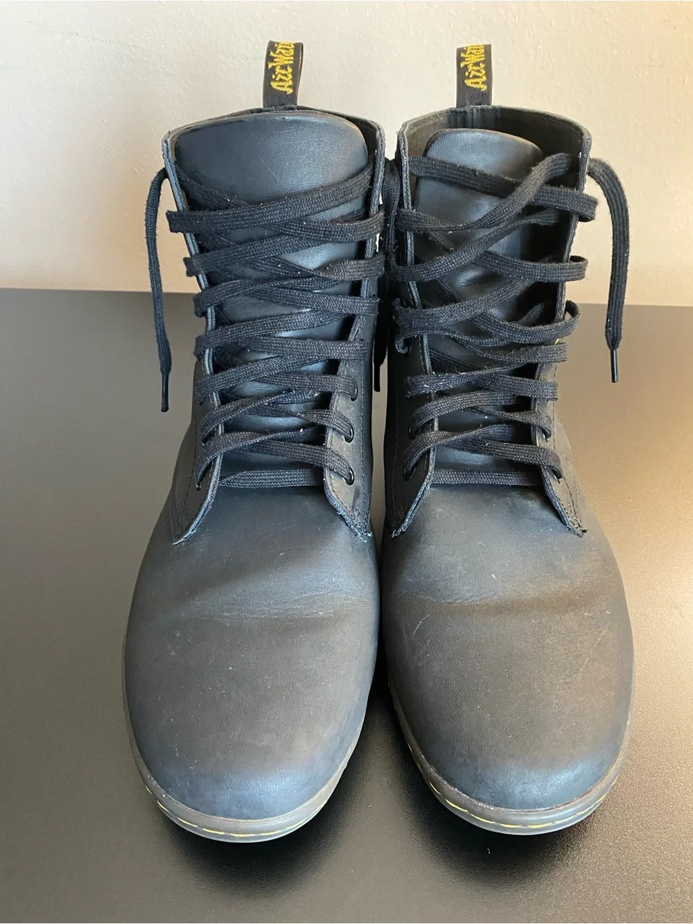 Dr. Martens Black Leather High-Top Lace-Up Boots with Yellow Stitching